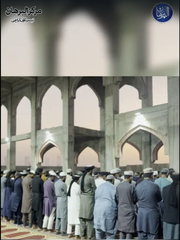 Markazi hall — congregation offering salah in the main hall